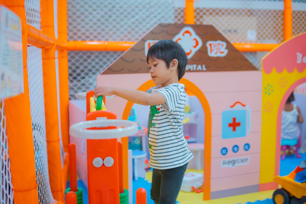 Child playing in a colorful therapy playroom