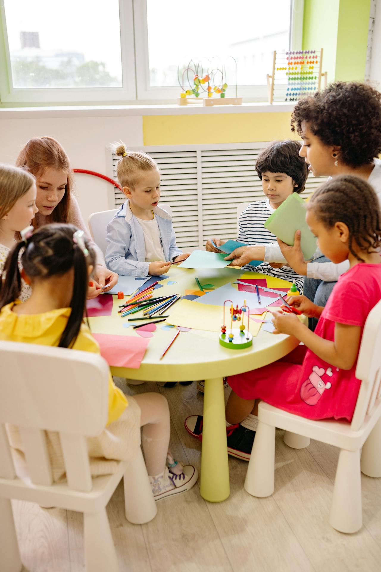 Children engaged in group learning activities at school